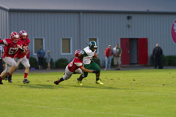 Bobby Staples tries to wrap up Daryl Manns