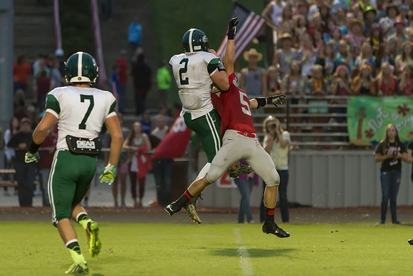 Remington Stanley catches pass above Bradley Lythgoe then goes i
